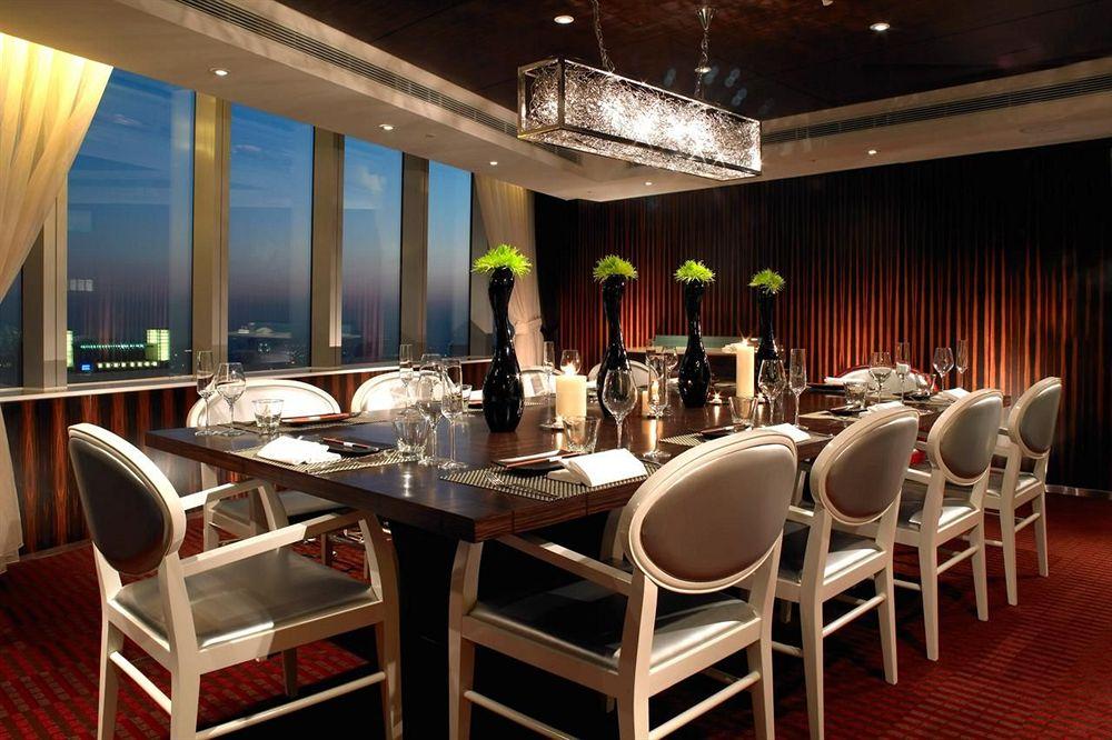 The Landis Taichung Hotel Exterior photo The Club Lounge at the Ritz-Carlton, Singapore